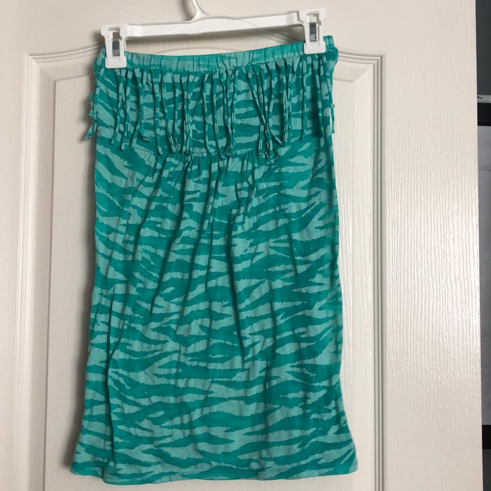 Teal tube top with tiger pattern.